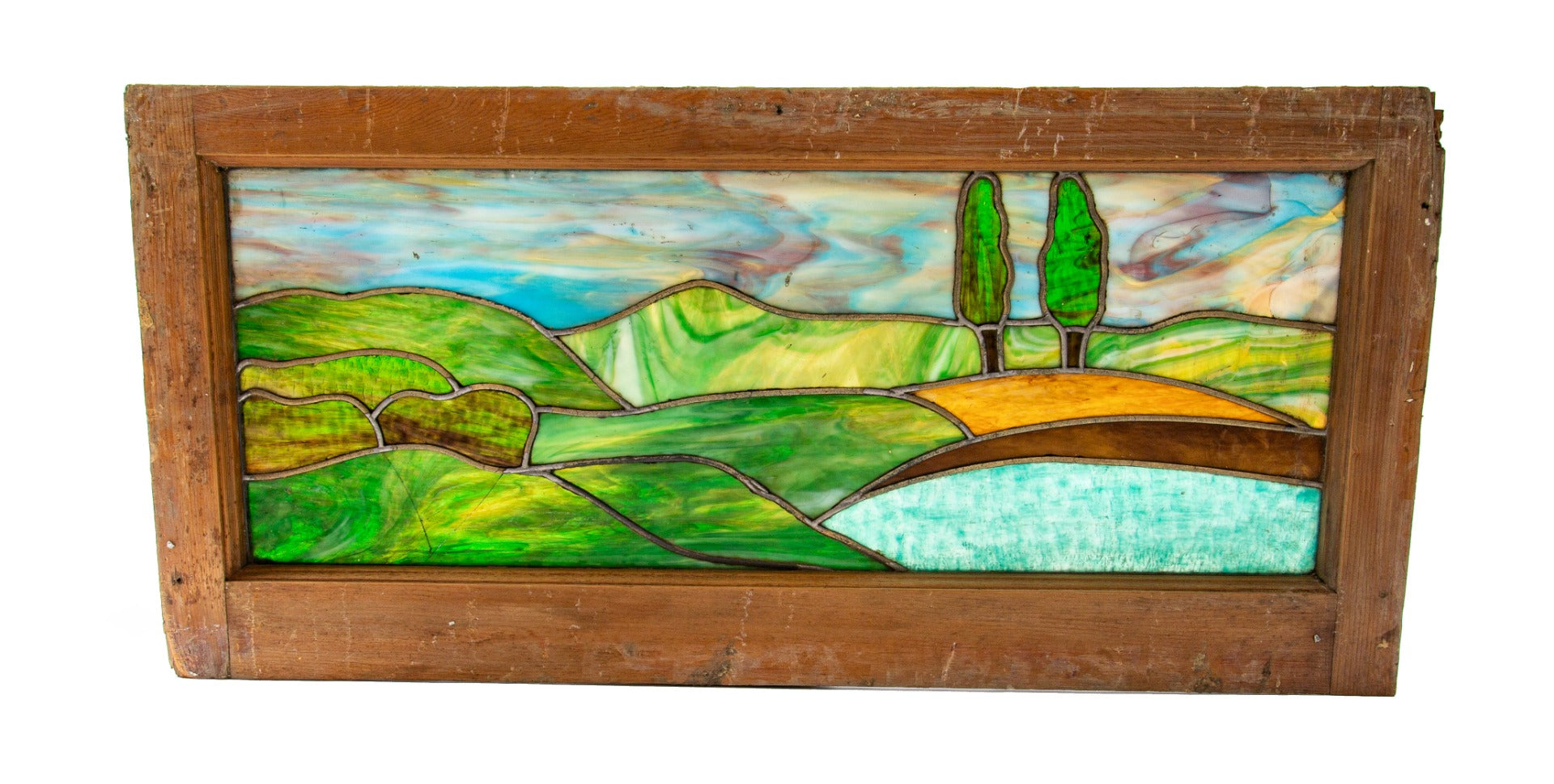 hard to find and highly desirable 1910 ebhardt richly colored scenic stained glass transom window with intact sash frame