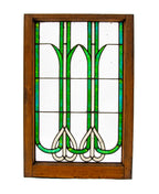 richly colored original early 20th century amerian art nouveau style leaded glass window with wood sash frame
