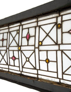 very unusual 1880s salvaged chicago custom-designed leaded glass geometric window with several oddly-shape jewels