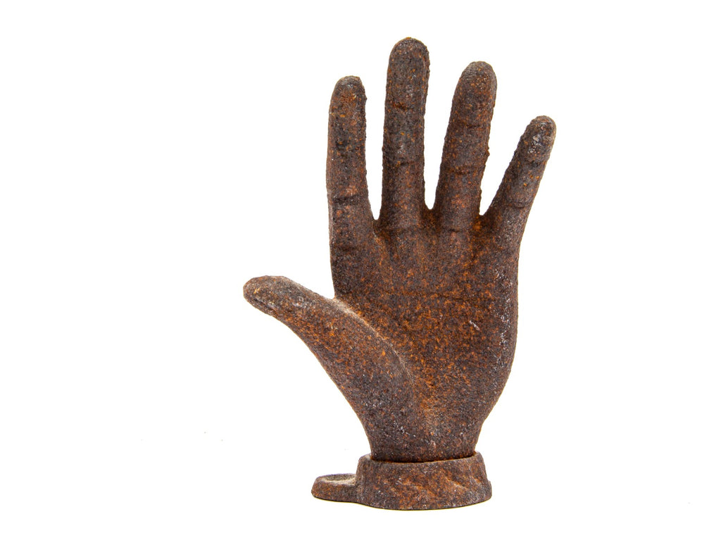 unusual early 20th century diminutive american folk art cast iron outstretched hand with base