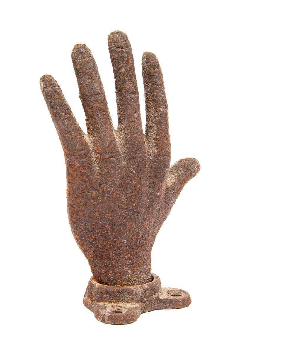 unusual early 20th century diminutive american folk art cast iron outstretched hand with base