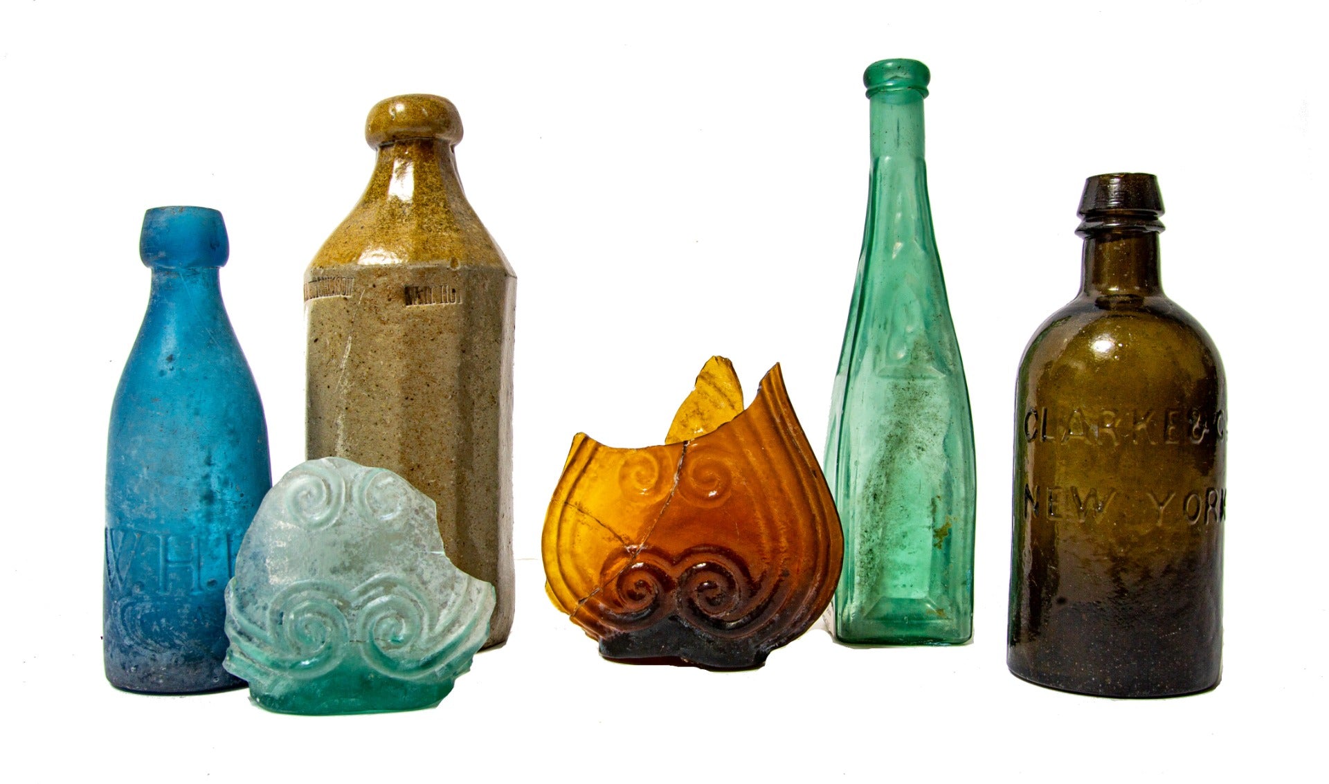 group of 1840s-1860s unearthed downtown chicago privy pit bottles and fragments