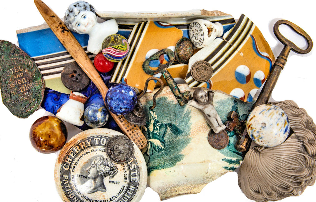 carefully cleaned and documented mid-19th to early 20th century fragments unearthed from chicago residential privy pits