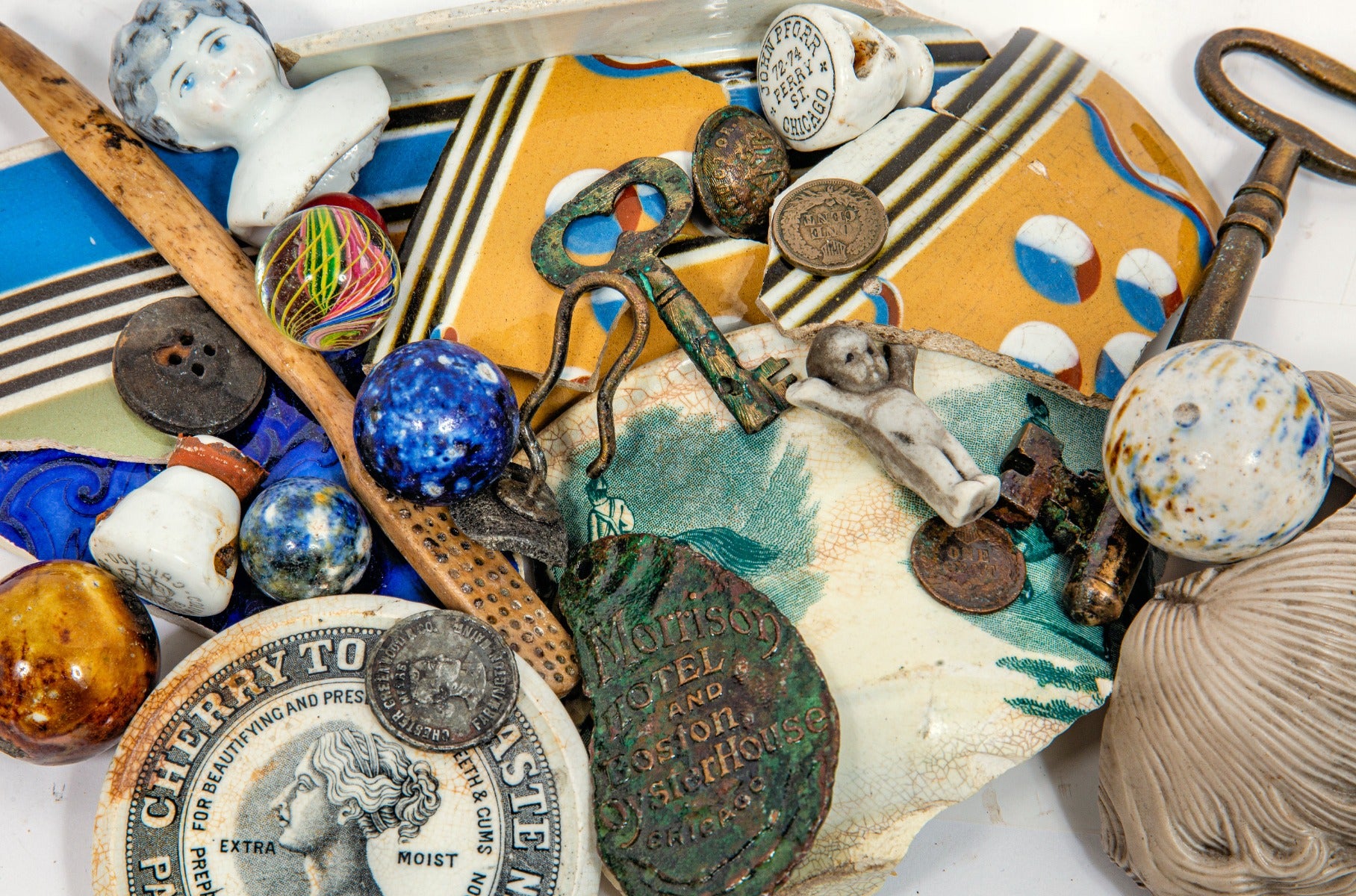 carefully cleaned and documented mid-19th to early 20th century fragments unearthed from chicago residential privy pits