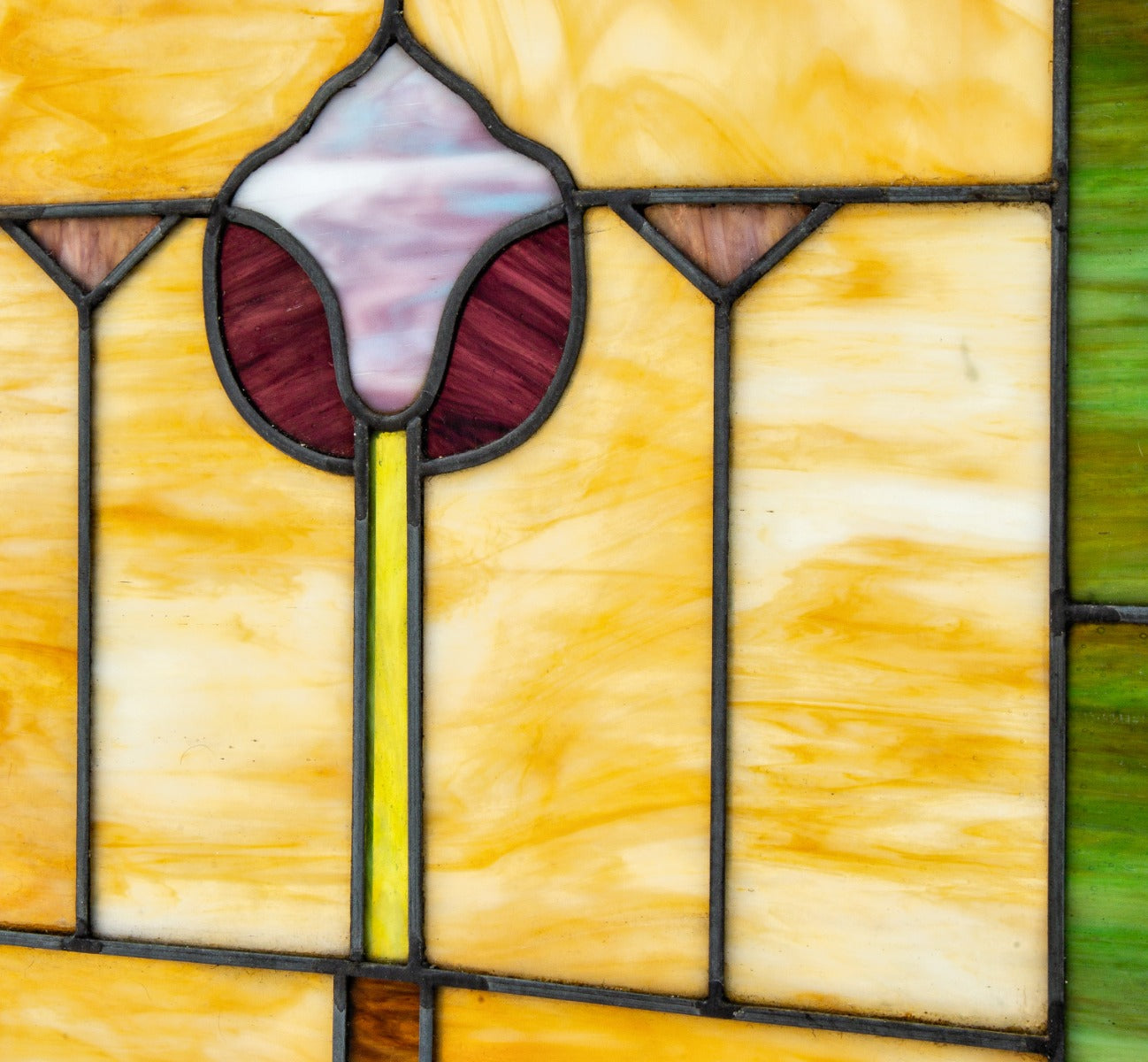 original and intact early 20th century eberhardt and company stained glass window with wood sash frame