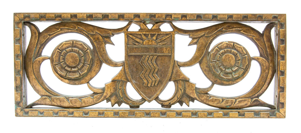 rare c. 1920's american ornamented double-sided cast bronze medinah athletic club exterior entrance door grille with starburst motif shield