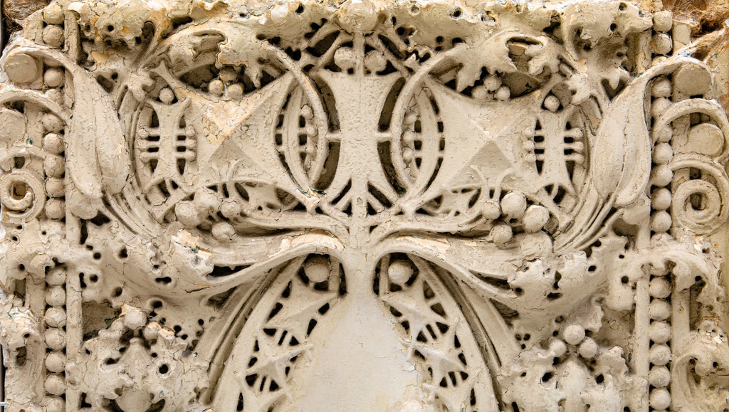 original claude and starck-designed exterior cast plaster "sullivanesque" panel salvaged from the 1911 carnegie library in rochelle, ills