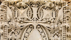 original claude and starck-designed exterior cast plaster "sullivanesque" panel salvaged from the 1911 carnegie library in rochelle, ills
