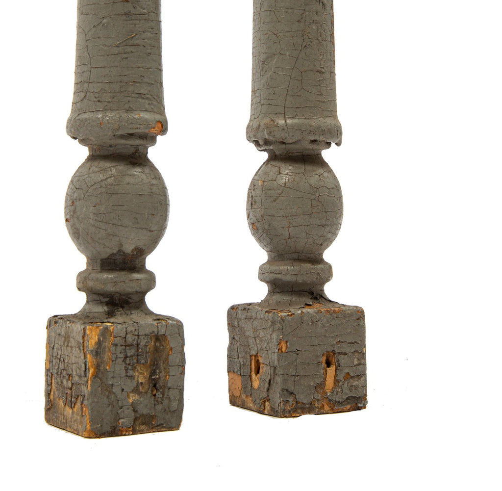 two matching painted yellow pine wood exterior balcony spindles salvaged from frank lloyd wright's francisco terrace during its demolition in 1974