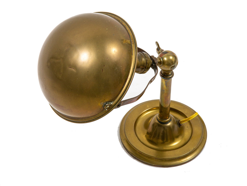 original early 20th century tilting spun brass faries table lamp with pivoting shade or reflector