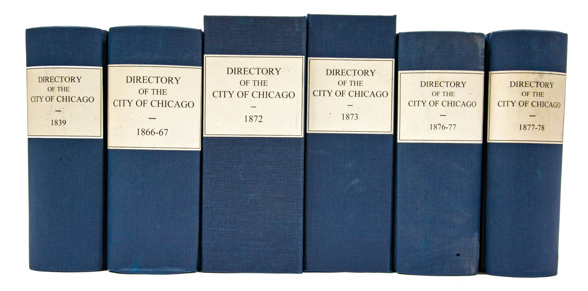group of carefully rebound and/or archival-boxed city of chicago directories dating to before and after the great chicago fire of 1871