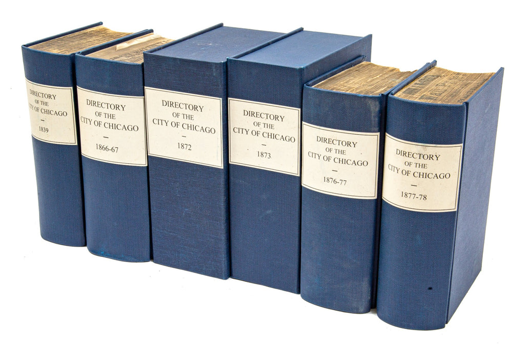 group of carefully rebound and/or archival-boxed city of chicago directories dating to before and after the great chicago fire of 1871