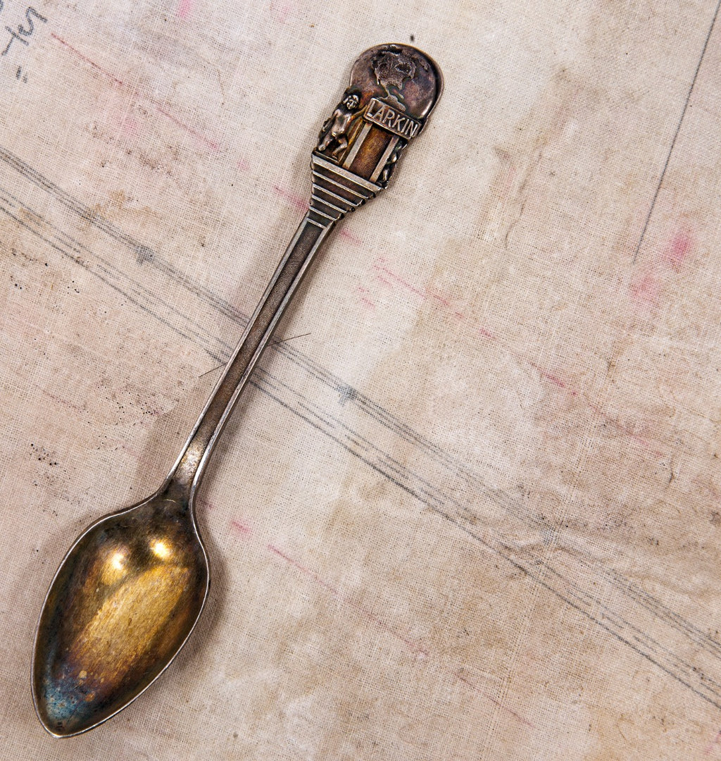 original diminutive j.d. larkin souvenir or gift silver spoon with richard bock sculpture