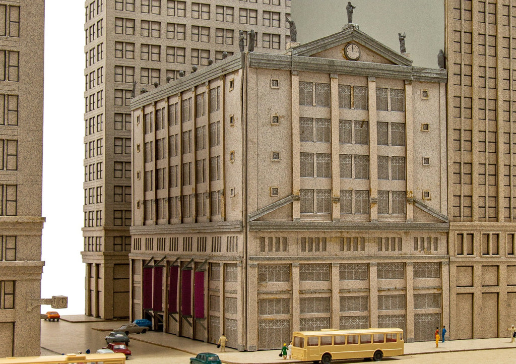 oversized and detailed 1990s stanley tigerman presentation model for a parking garage located on the se corner of state and washington streets