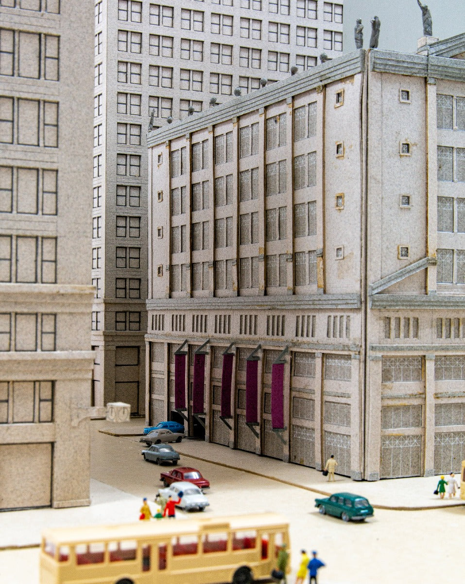 oversized and detailed 1990s stanley tigerman presentation model for a parking garage located on the se corner of state and washington streets