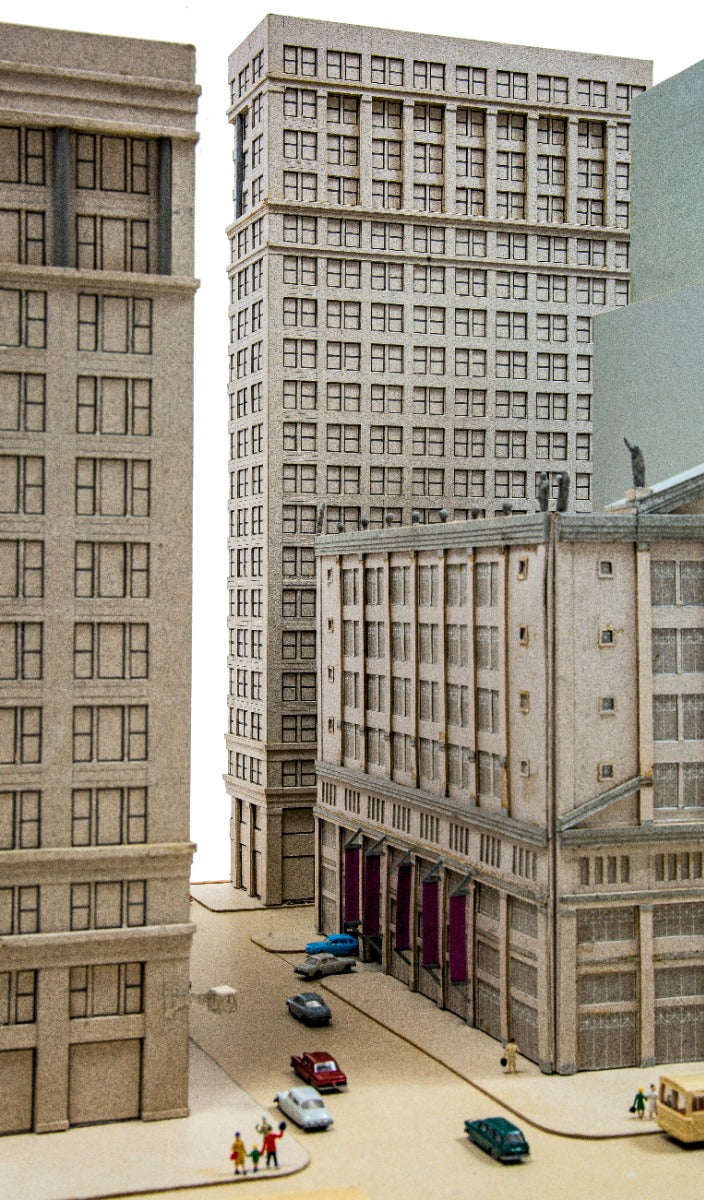 oversized and detailed 1990s stanley tigerman presentation model for a parking garage located on the se corner of state and washington streets