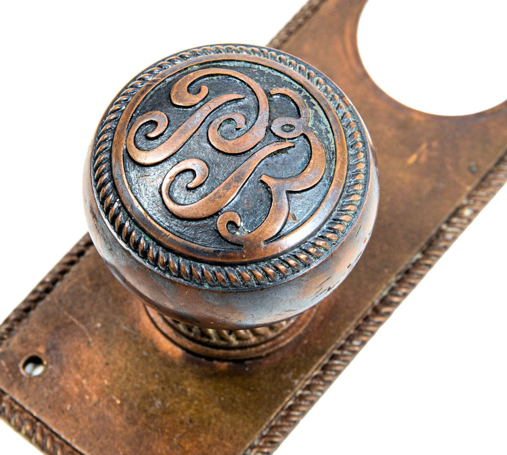 original holabird and roche-designed pontiac building custom office door hardware with mostly intact two-tone finish