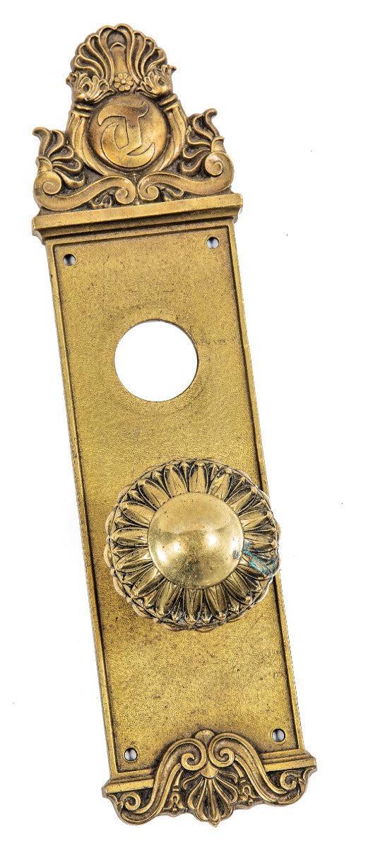original hard to find holabird and roche-designed cast brass chicago tribune building doorknob and matching monogrammed backplate