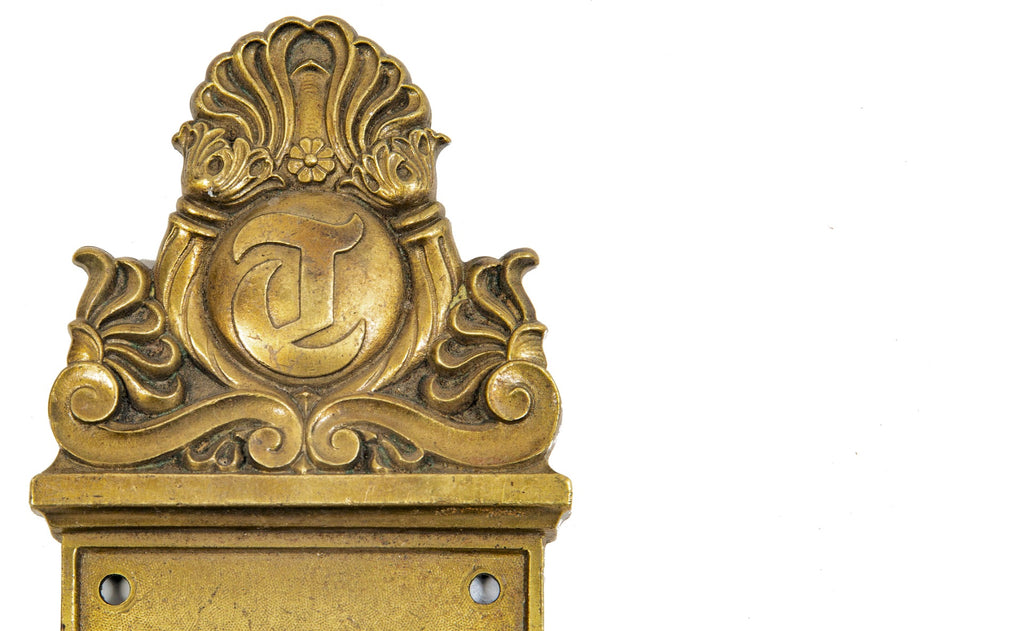 original 1901 holabird and roche-designed cast brass tribune building office door backplate and doorknob