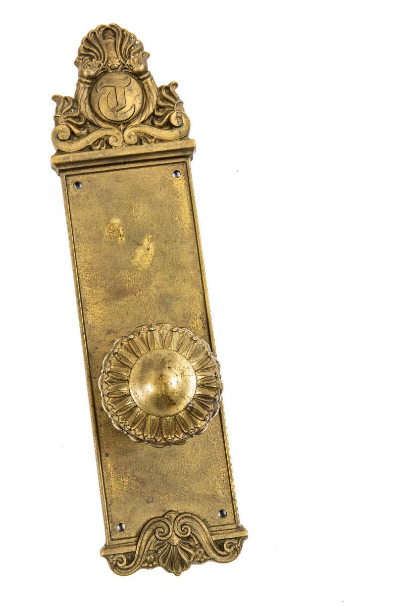 original 1901 holabird and roche-designed cast brass tribune building office door backplate and doorknob