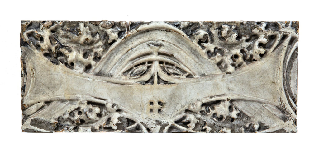 two original louis h. sullivan-designed white glazed terra cotta panel from schlesinger and mayer store and daniel burnham's 1905 addition