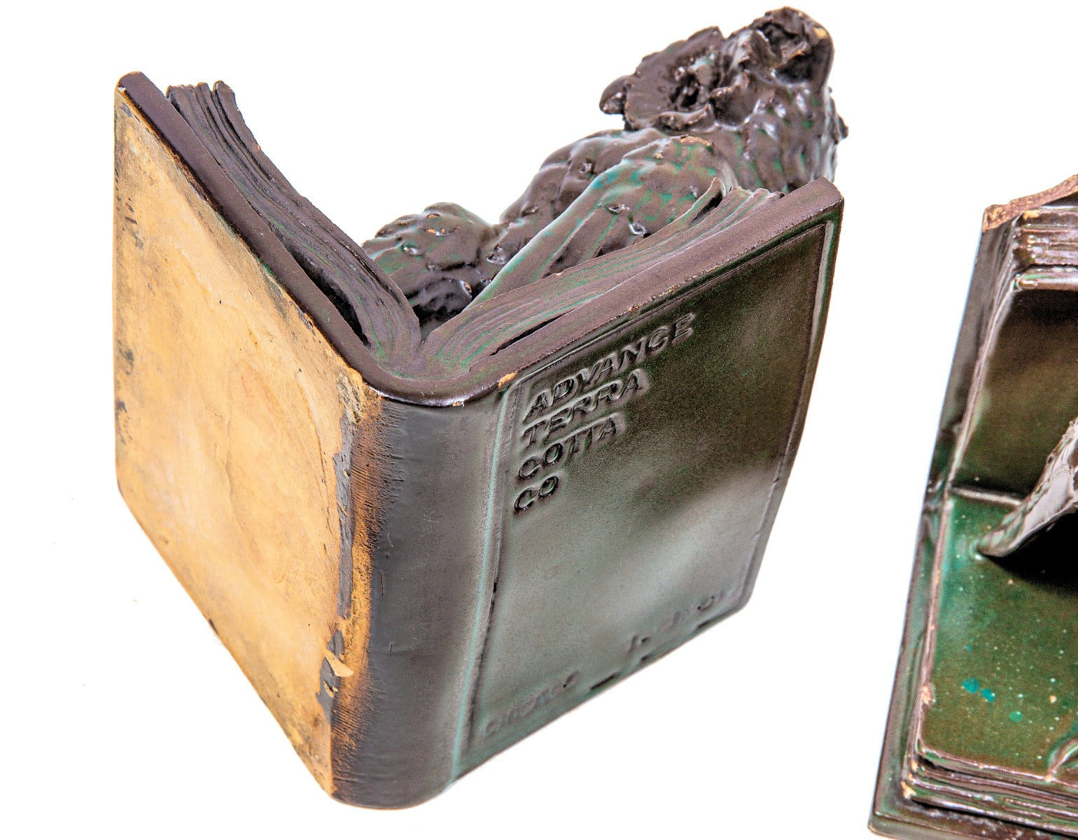 one of two very rare all original and richly colored advance terra cotta owl bookend salesman sample