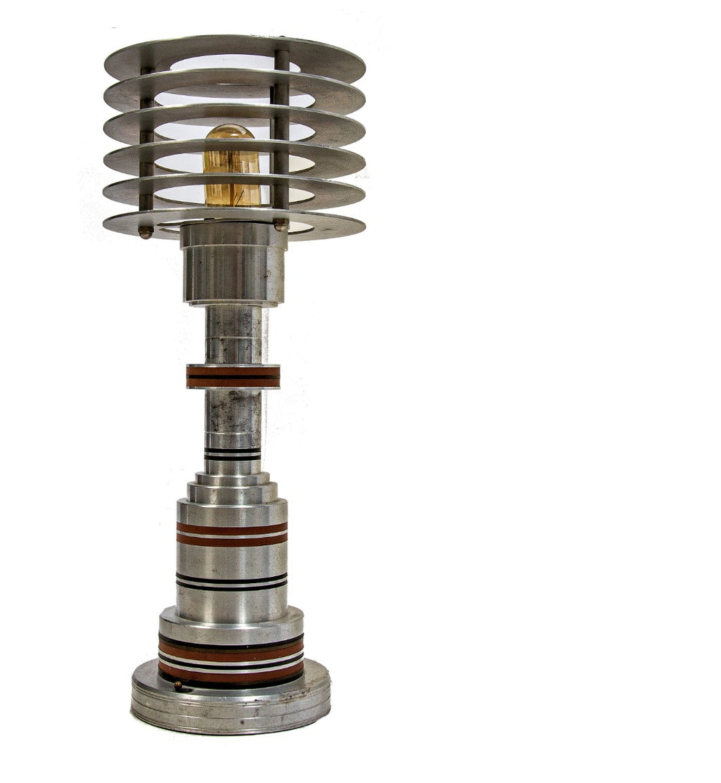 highly sought after iconic american art deco machine age c. 1930's walter von nessen spun aluminum and bakelite table or desk lamp