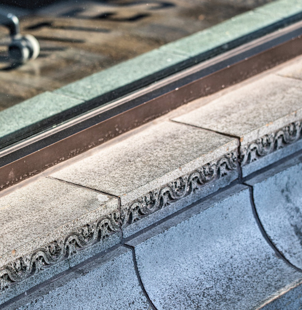 original 1922 spray-glazed louis h. sullivan-designed krause music store terra cotta storefront window surround assemblage