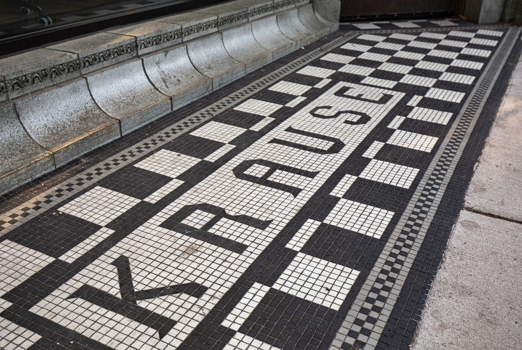 original 1922 spray-glazed louis h. sullivan-designed krause music store terra cotta storefront window surround assemblage