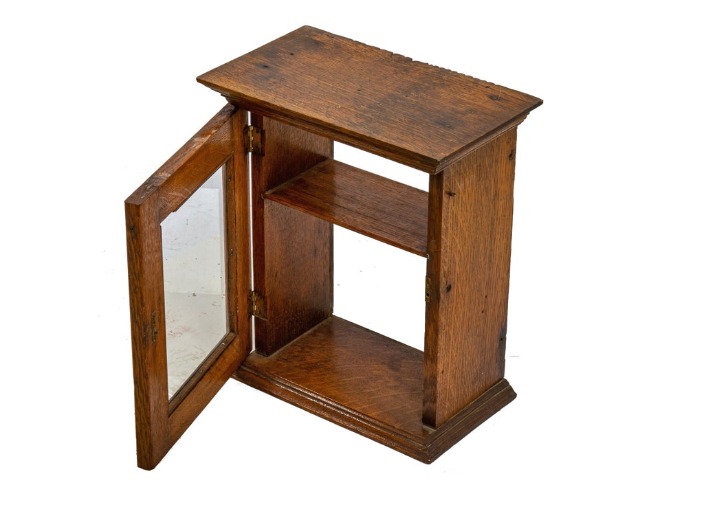 original early 20th century solid oak wood counter top display cabinet with hinged door and single shelf