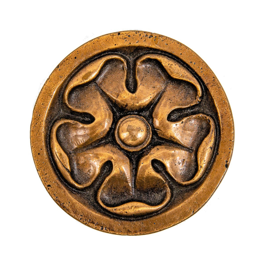 original 1927 diminutive cast bronze medallion salvaged from the interior lobby of giaver and dinkelberg's jewelers building