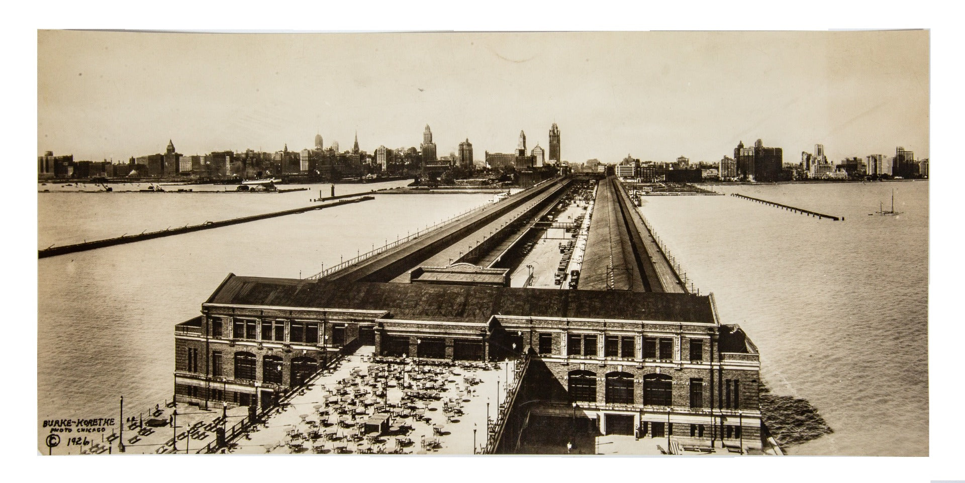 original panoramic image of charles sumner frost's navy pier (1916) and chicago skyline as it appeared in 1927.