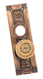 original late 19th or early 20th century ornamental cast bronze "empire" pattern entrance doorknob and backplate
