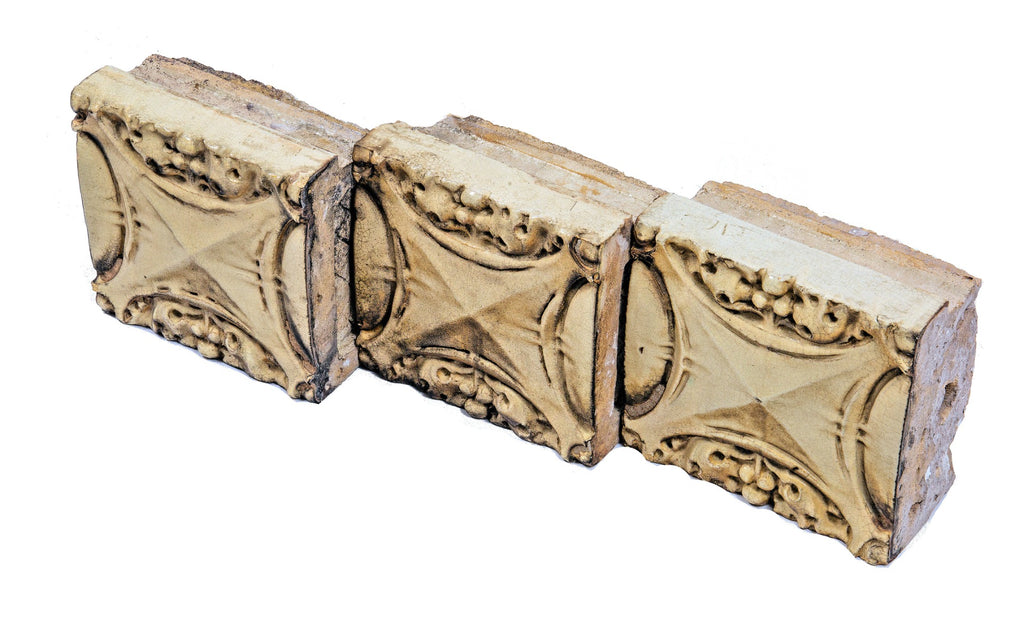 three matching rissman and hirschfeld-designed cream glazed terra cotta sullivanesque blocks salvaged from lincoln-montana building