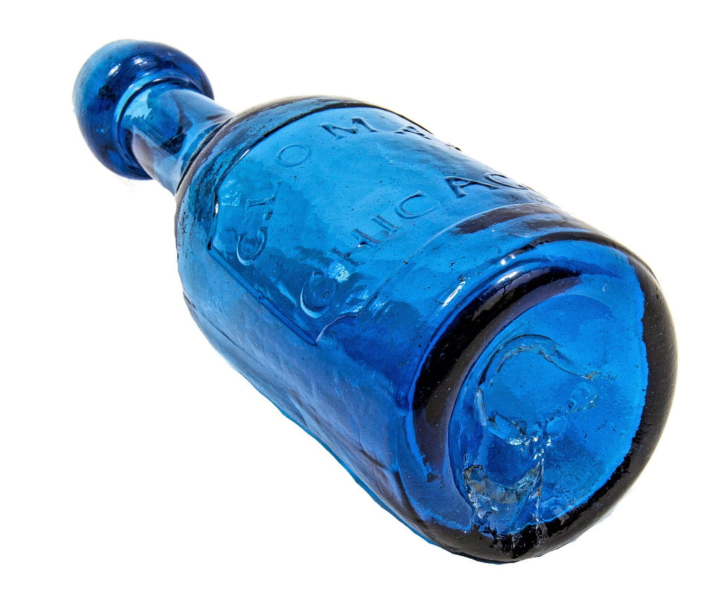1850s cobalt blue glass iron-pontiled chicago bottler george lomax iron-pontiled privy dug bottle with long neck and single panel with embossed lettering