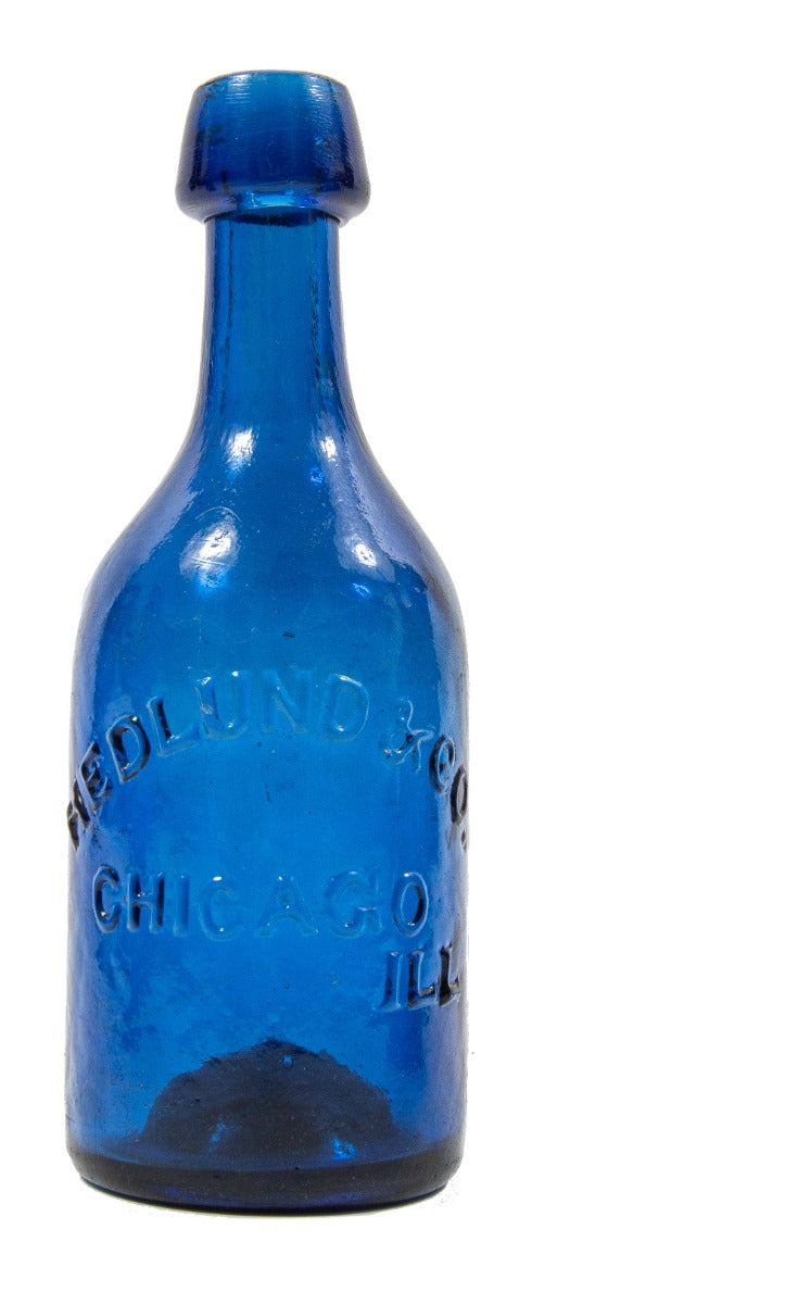 1850's richly colored sapphire blue glass iron pontiled soda bottle with appealing crudity fabricated for chicago bottlers hedlund & co.