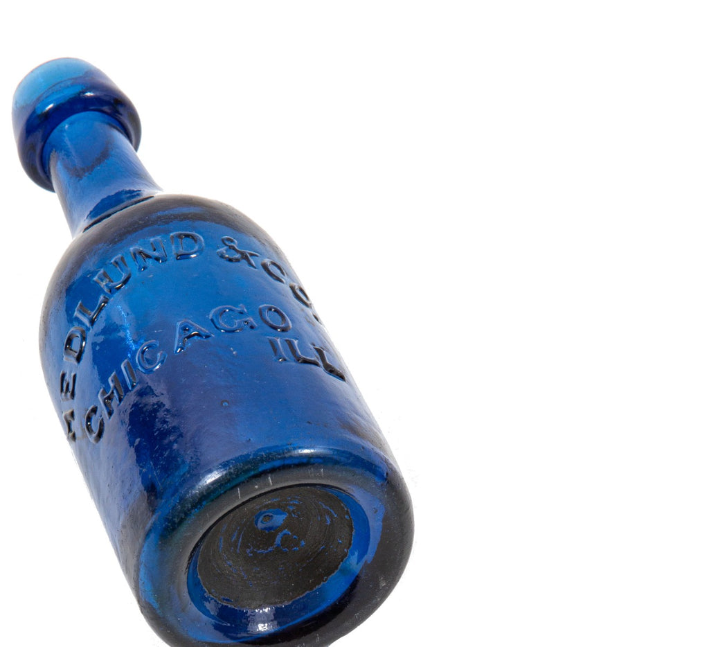 1850's richly colored sapphire blue glass iron pontiled soda bottle with appealing crudity fabricated for chicago bottlers hedlund & co.