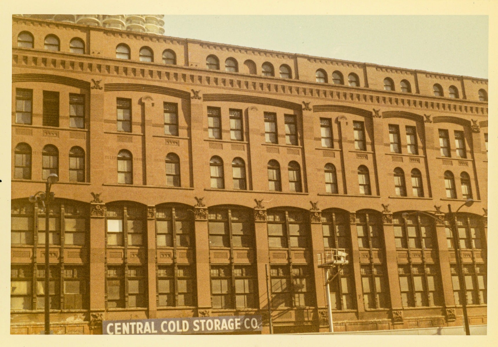 group of photographic images of  george h. edbrooke's 9-story hiram sibley warehouse (later known as the central cold storage company)