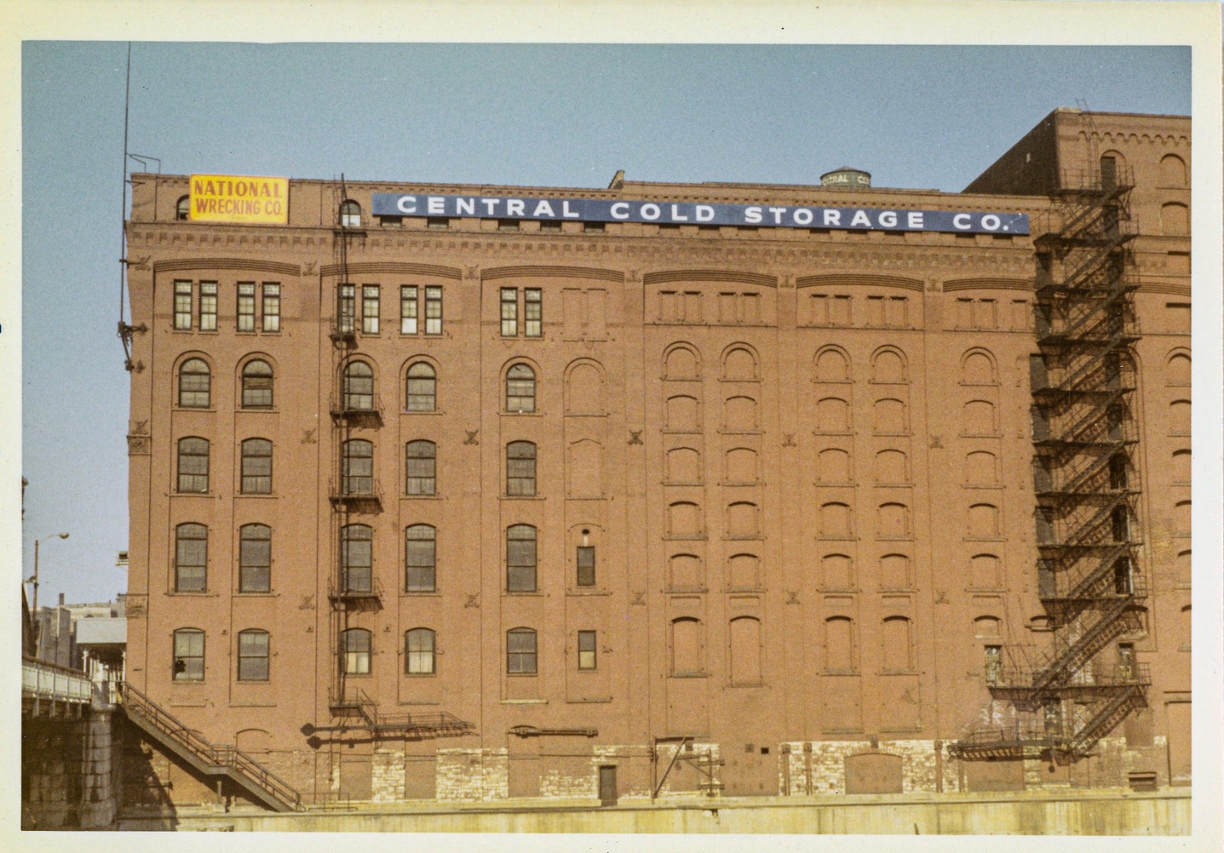 group of photographic images of  george h. edbrooke's 9-story hiram sibley warehouse (later known as the central cold storage company)
