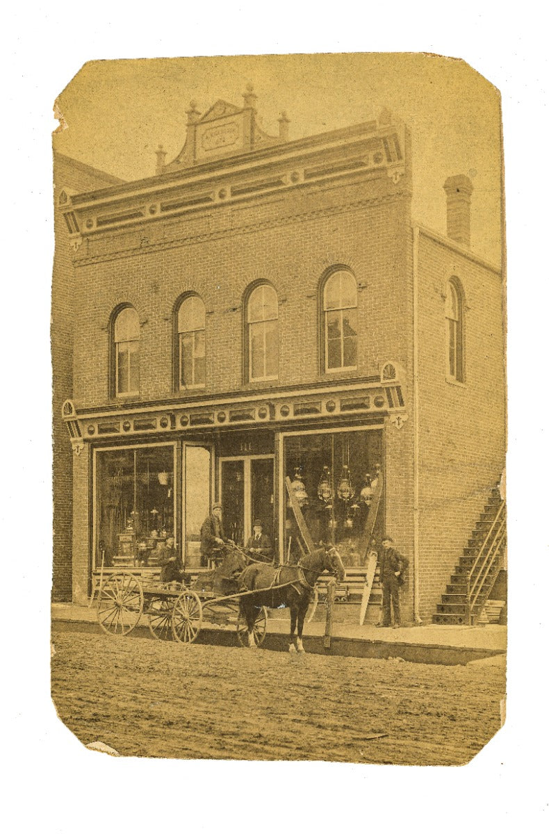 original mounted albumen print of 19th century early lighting store housed in the albert kickbusch 1872 commerical building
