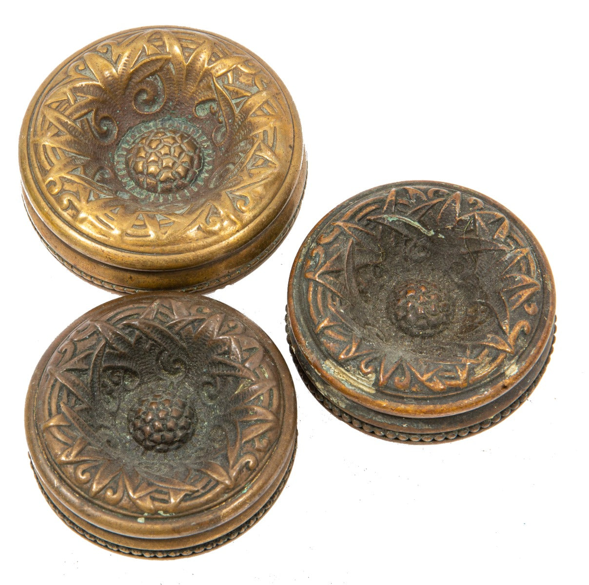 group of matching "romanesque" pattern or pineapple design 1890s p. & f. corbin doorknobs with deeply sunken centers