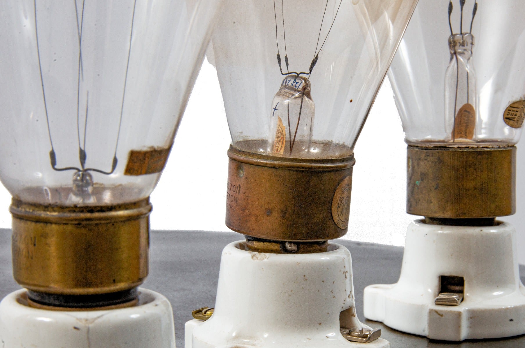 group of late 19th and early 20th century antique american carbon filament "tipped" incandescent lightbulbs