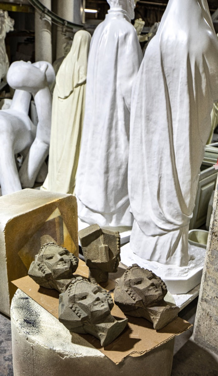 limited edition frank lloyd wright and alfonso iannelli-designed patinated composite midway gardens sprite or "spindle" head cast from original