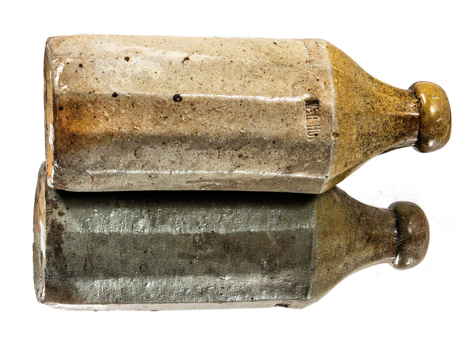 rare and historically important 1850s two-tone salt-glazed faceted william h. hutchinson pottery bottle dug from downtown chicago privy pit