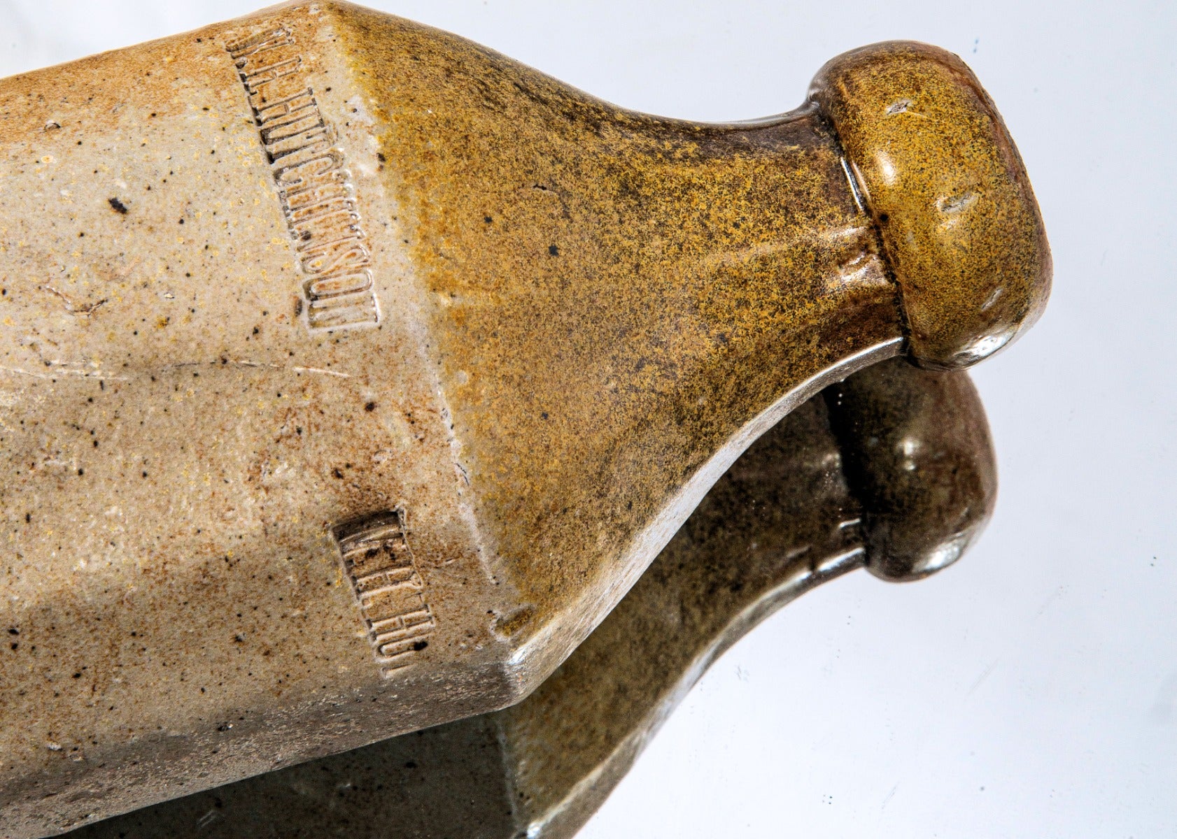 rare and historically important 1850s two-tone salt-glazed faceted william h. hutchinson pottery bottle dug from downtown chicago privy pit