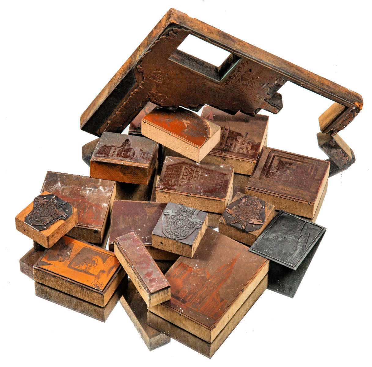 group of original early 20th century odin j. oyen print wood blocks of various commissions his design firm worked on within the midwest