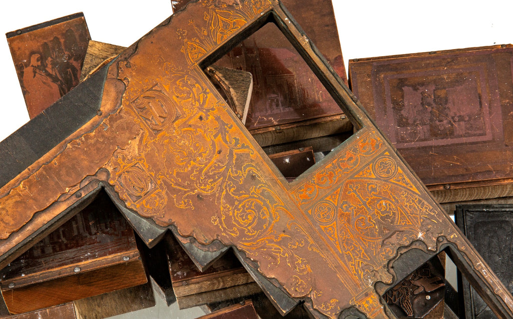 group of original early 20th century odin j. oyen print wood blocks of various commissions his design firm worked on within the midwest