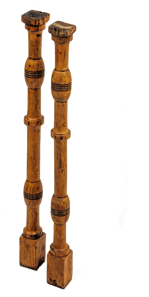 matching set of custom-designed staircase oak wood spindles from adler and sullivan's max. m. rothschild rowhouses (1883), located at 3201-3205 south indiana avenue, chicago, il.