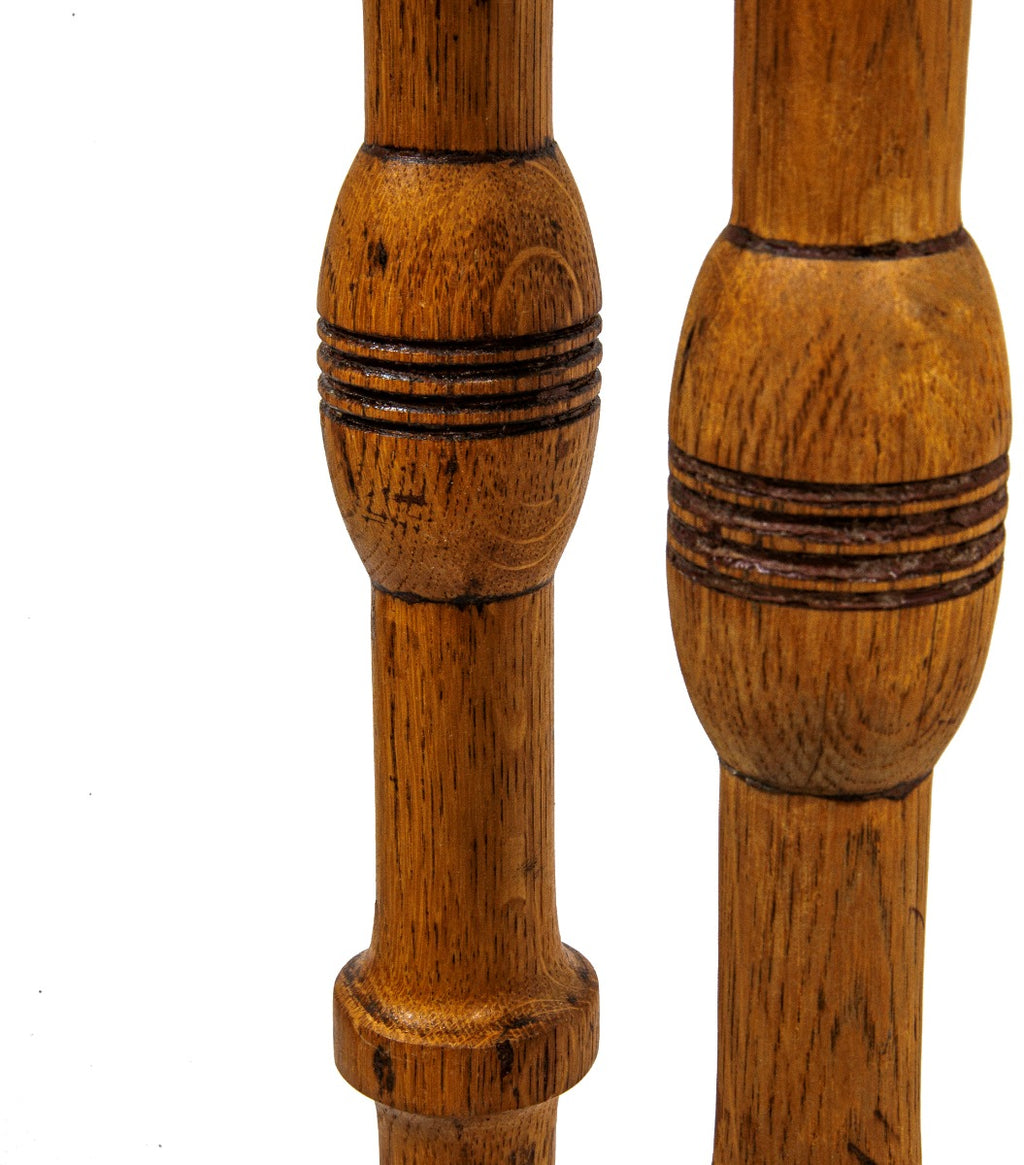 matching set of custom-designed staircase oak wood spindles from adler and sullivan's max. m. rothschild rowhouses (1883), located at 3201-3205 south indiana avenue, chicago, il.