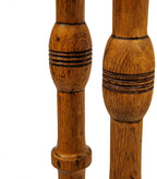 matching set of custom-designed staircase oak wood spindles from adler and sullivan's max. m. rothschild rowhouses (1883), located at 3201-3205 south indiana avenue, chicago, il.